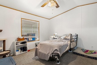 Discover this charming 2-bedroom, 2-bath retreat nestled under a on Links At Lands End in Texas - for sale on GolfHomes.com, golf home, golf lot