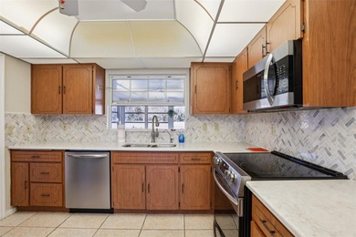 Welcome to your fully furnished Florida retreat in the highly on Sandpiper Golf Club in Florida - for sale on GolfHomes.com, golf home, golf lot