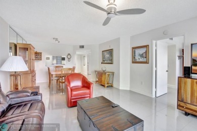 Enjoy the spectacular LAKE view from this beautiful 2/2 located on Flamingo Lakes Country Club in Florida - for sale on GolfHomes.com, golf home, golf lot