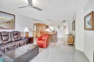 Enjoy the spectacular LAKE view from this beautiful 2/2 located on Flamingo Lakes Country Club in Florida - for sale on GolfHomes.com, golf home, golf lot