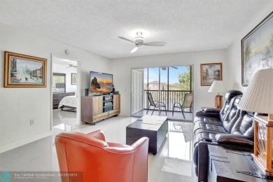 Enjoy the spectacular LAKE view from this beautiful 2/2 located on Flamingo Lakes Country Club in Florida - for sale on GolfHomes.com, golf home, golf lot