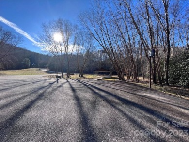 Gorgeous lot situated within walking distance to common area on Lake Lure Municipal Golf Course in North Carolina - for sale on GolfHomes.com, golf home, golf lot