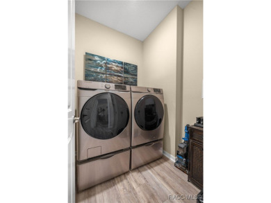 Welcome to this bright, open, and impeccably upgraded 2-bedroom on River Greens Golf Course in Florida - for sale on GolfHomes.com, golf home, golf lot