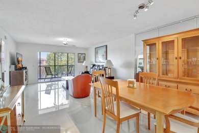 Enjoy the spectacular LAKE view from this beautiful 2/2 located on Flamingo Lakes Country Club in Florida - for sale on GolfHomes.com, golf home, golf lot