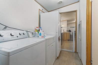Discover this charming 2-bedroom, 2-bath retreat nestled under a on Links At Lands End in Texas - for sale on GolfHomes.com, golf home, golf lot
