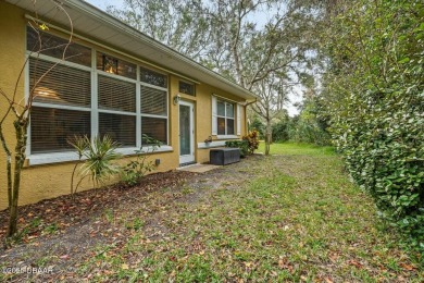 Discover this charming 3-bedroom, 2-bath villa with a 2-car on Halifax Plantation Golf Club in Florida - for sale on GolfHomes.com, golf home, golf lot