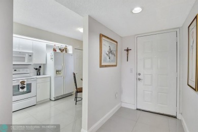 Enjoy the spectacular LAKE view from this beautiful 2/2 located on Flamingo Lakes Country Club in Florida - for sale on GolfHomes.com, golf home, golf lot