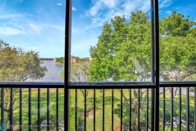 Enjoy the spectacular LAKE view from this beautiful 2/2 located on Flamingo Lakes Country Club in Florida - for sale on GolfHomes.com, golf home, golf lot