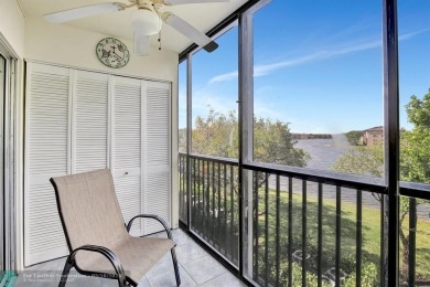 Enjoy the spectacular LAKE view from this beautiful 2/2 located on Flamingo Lakes Country Club in Florida - for sale on GolfHomes.com, golf home, golf lot