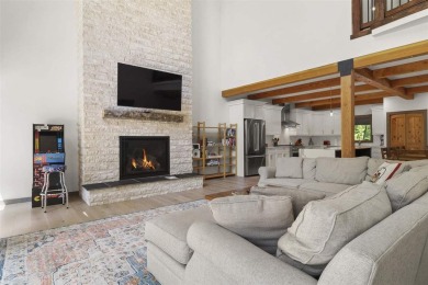 Welcome to Chalet des Beagle--an exceptional ski-in/ski-out on Boyne Mountain Resort - Monument Course in Michigan - for sale on GolfHomes.com, golf home, golf lot