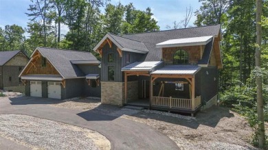 Welcome to Chalet des Beagle--an exceptional ski-in/ski-out on Boyne Mountain Resort - Monument Course in Michigan - for sale on GolfHomes.com, golf home, golf lot