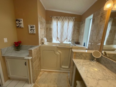Listed by the Official Sales Team of Cypress Lakes Village on Big Cypress Golf and Country Club in Florida - for sale on GolfHomes.com, golf home, golf lot