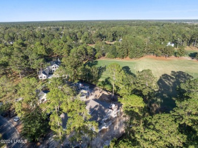 This charming Lowcountry home combines Southern style porches on Oldfield Golf Club in South Carolina - for sale on GolfHomes.com, golf home, golf lot