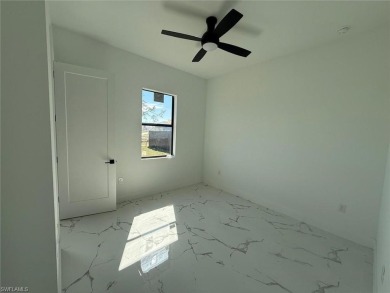 Welcome to a breathtaking new construction single-family home on Del Tura Golf and Country Club in Florida - for sale on GolfHomes.com, golf home, golf lot