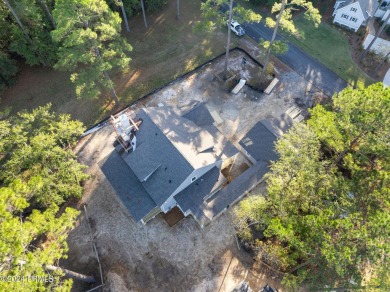 This charming Lowcountry home combines Southern style porches on Oldfield Golf Club in South Carolina - for sale on GolfHomes.com, golf home, golf lot