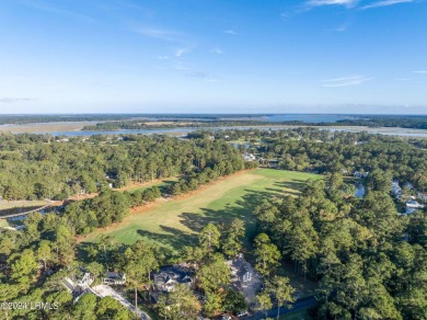 This charming Lowcountry home combines Southern style porches on Oldfield Golf Club in South Carolina - for sale on GolfHomes.com, golf home, golf lot