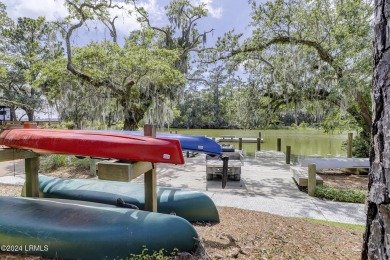 This charming Lowcountry home combines Southern style porches on Oldfield Golf Club in South Carolina - for sale on GolfHomes.com, golf home, golf lot