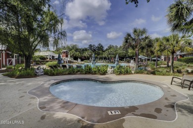 This charming Lowcountry home combines Southern style porches on Oldfield Golf Club in South Carolina - for sale on GolfHomes.com, golf home, golf lot