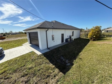 Welcome to a breathtaking new construction single-family home on Del Tura Golf and Country Club in Florida - for sale on GolfHomes.com, golf home, golf lot