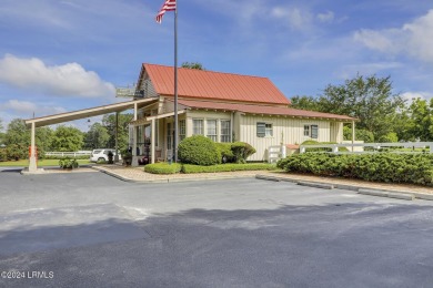 This charming Lowcountry home combines Southern style porches on Oldfield Golf Club in South Carolina - for sale on GolfHomes.com, golf home, golf lot