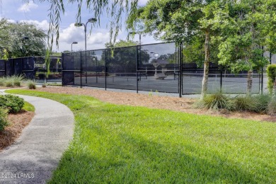 This charming Lowcountry home combines Southern style porches on Oldfield Golf Club in South Carolina - for sale on GolfHomes.com, golf home, golf lot