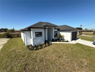 Welcome to a breathtaking new construction single-family home on Del Tura Golf and Country Club in Florida - for sale on GolfHomes.com, golf home, golf lot