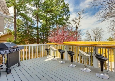 You'll enjoy this Holiday Island getaway on the 19-hole golf on Holiday Island Golf Course in Arkansas - for sale on GolfHomes.com, golf home, golf lot