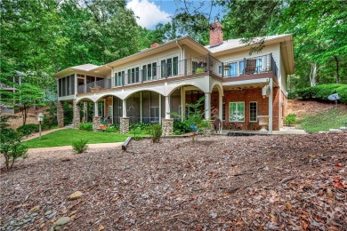 KEOWEE KEY LAKEFRONT HOME ON LEVEL LOT & BEACH! COVERED DOCK IN on Keowee Key Golf and Country Club in South Carolina - for sale on GolfHomes.com, golf home, golf lot