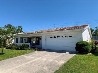 PRICED WELL UNDER APPRAISAL!  Welcome to the vibrant senior on Mainlands Golf Club in Florida - for sale on GolfHomes.com, golf home, golf lot