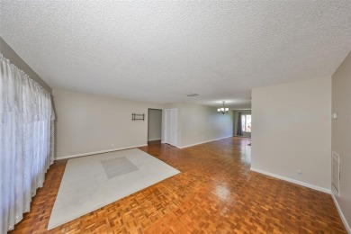 PRICED WELL UNDER APPRAISAL!  Welcome to the vibrant senior on Mainlands Golf Club in Florida - for sale on GolfHomes.com, golf home, golf lot
