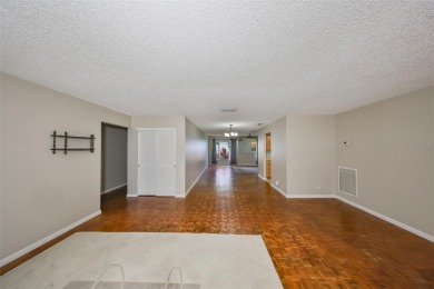 PRICED WELL UNDER APPRAISAL!  Welcome to the vibrant senior on Mainlands Golf Club in Florida - for sale on GolfHomes.com, golf home, golf lot