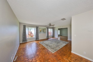 PRICED WELL UNDER APPRAISAL!  Welcome to the vibrant senior on Mainlands Golf Club in Florida - for sale on GolfHomes.com, golf home, golf lot