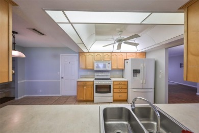 PRICED WELL UNDER APPRAISAL!  Welcome to the vibrant senior on Mainlands Golf Club in Florida - for sale on GolfHomes.com, golf home, golf lot