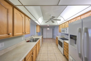 PRICED WELL UNDER APPRAISAL!  Welcome to the vibrant senior on Mainlands Golf Club in Florida - for sale on GolfHomes.com, golf home, golf lot