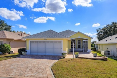 TRULY A MUST SEE SINGLE-STORY CBS HOME located in the desirable on Monarch At Royal Highlands in Florida - for sale on GolfHomes.com, golf home, golf lot