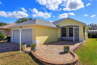 TRULY A MUST SEE SINGLE-STORY CBS HOME located in the desirable on Monarch At Royal Highlands in Florida - for sale on GolfHomes.com, golf home, golf lot