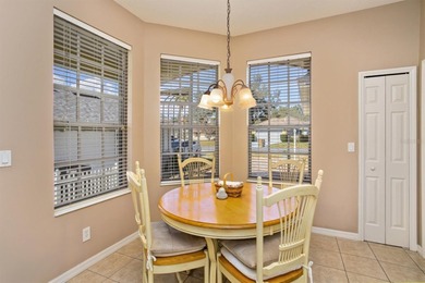 TRULY A MUST SEE SINGLE-STORY CBS HOME located in the desirable on Monarch At Royal Highlands in Florida - for sale on GolfHomes.com, golf home, golf lot