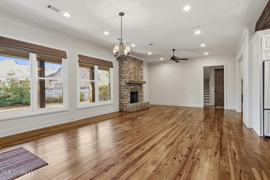 Beautifully situated on a lovely lot in Reunion, this 4 or 5 on Reunion Golf Club in Mississippi - for sale on GolfHomes.com, golf home, golf lot