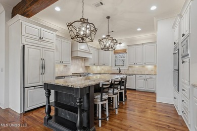 Beautifully situated on a lovely lot in Reunion, this 4 or 5 on Reunion Golf Club in Mississippi - for sale on GolfHomes.com, golf home, golf lot