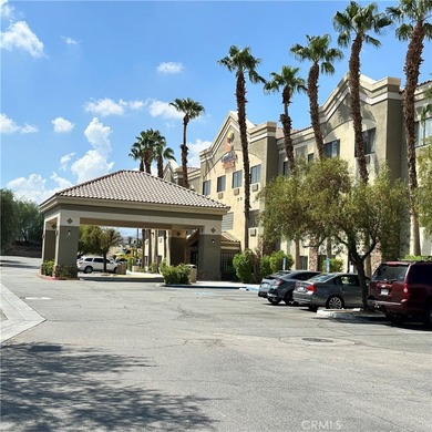 The lot in the entry of a two Hotels complex-Comfort Inn and on Palm Desert Country Club in California - for sale on GolfHomes.com, golf home, golf lot