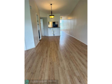 Stunning 2 Bedroom, 2 Bath Corner Unit in Breezes at Palm Aire! on Palm-Aire Country Club and Resort - Palms in Florida - for sale on GolfHomes.com, golf home, golf lot