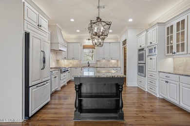 Beautifully situated on a lovely lot in Reunion, this 4 or 5 on Reunion Golf Club in Mississippi - for sale on GolfHomes.com, golf home, golf lot