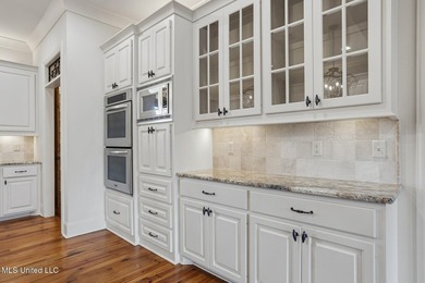 Beautifully situated on a lovely lot in Reunion, this 4 or 5 on Reunion Golf Club in Mississippi - for sale on GolfHomes.com, golf home, golf lot