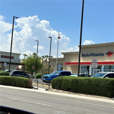 The lot in the entry of a two Hotels complex-Comfort Inn and on Palm Desert Country Club in California - for sale on GolfHomes.com, golf home, golf lot