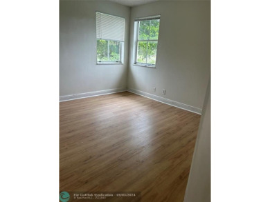 Stunning 2 Bedroom, 2 Bath Corner Unit in Breezes at Palm Aire! on Palm-Aire Country Club and Resort - Palms in Florida - for sale on GolfHomes.com, golf home, golf lot