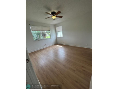 Stunning 2 Bedroom, 2 Bath Corner Unit in Breezes at Palm Aire! on Palm-Aire Country Club and Resort - Palms in Florida - for sale on GolfHomes.com, golf home, golf lot