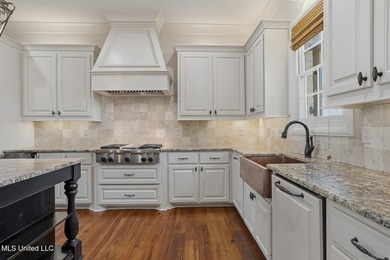 Beautifully situated on a lovely lot in Reunion, this 4 or 5 on Reunion Golf Club in Mississippi - for sale on GolfHomes.com, golf home, golf lot