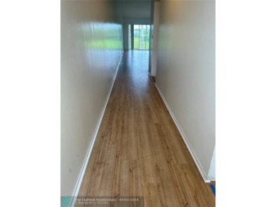 Stunning 2 Bedroom, 2 Bath Corner Unit in Breezes at Palm Aire! on Palm-Aire Country Club and Resort - Palms in Florida - for sale on GolfHomes.com, golf home, golf lot