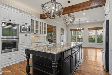 Beautifully situated on a lovely lot in Reunion, this 4 or 5 on Reunion Golf Club in Mississippi - for sale on GolfHomes.com, golf home, golf lot