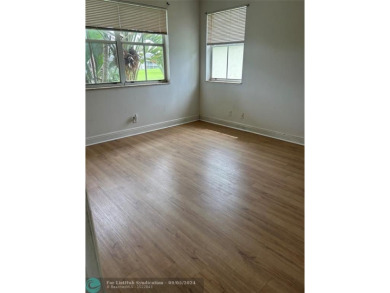 Stunning 2 Bedroom, 2 Bath Corner Unit in Breezes at Palm Aire! on Palm-Aire Country Club and Resort - Palms in Florida - for sale on GolfHomes.com, golf home, golf lot